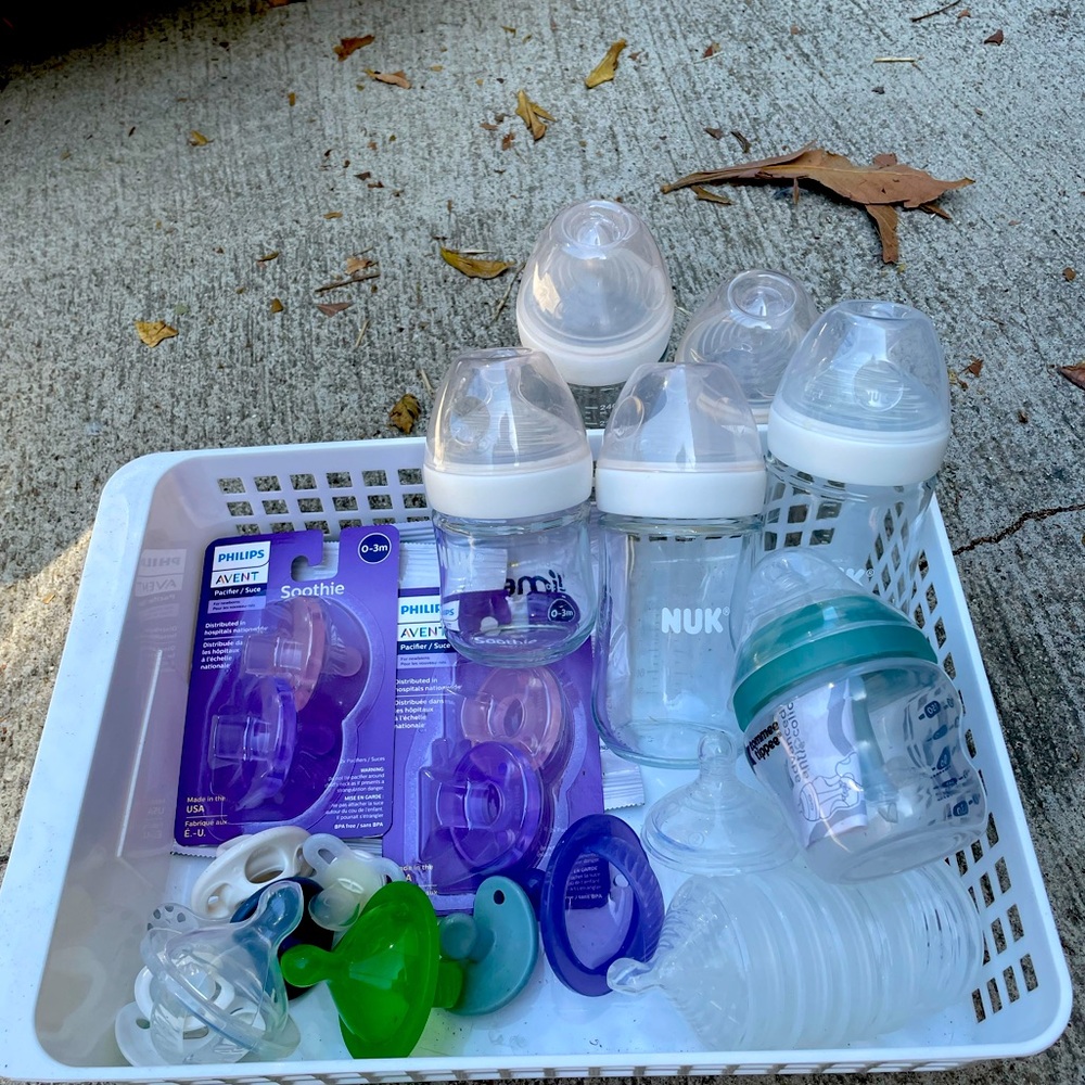 Misc set of bottles and pacifiers gently used